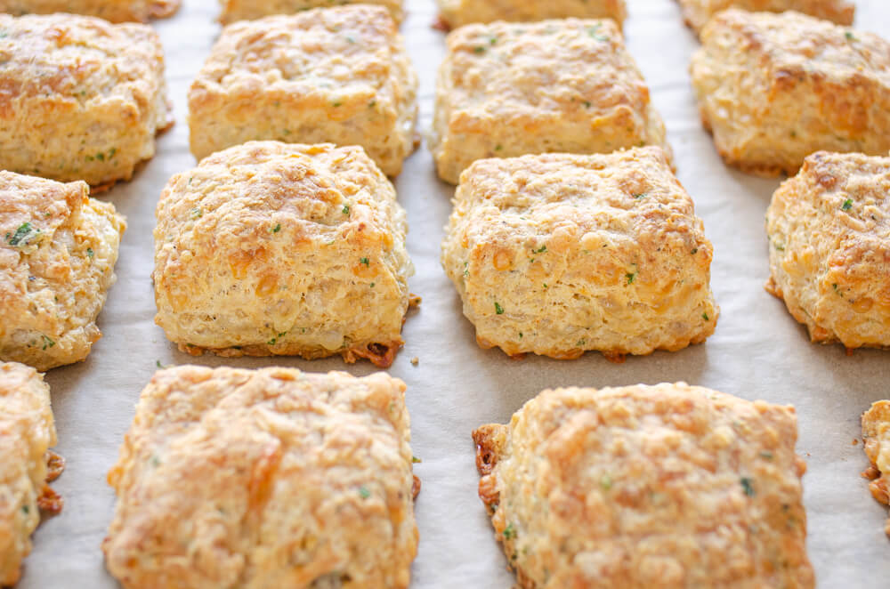 cooked biscuits on cookie sheet