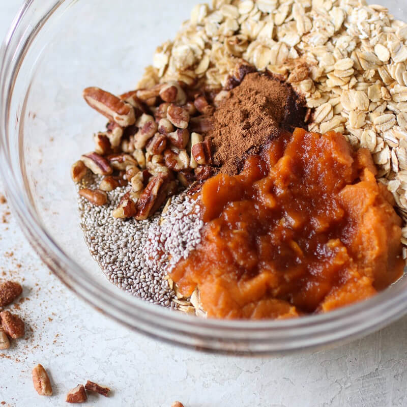 Pumpkin pie overnight oat ingredients in mixing bowl
