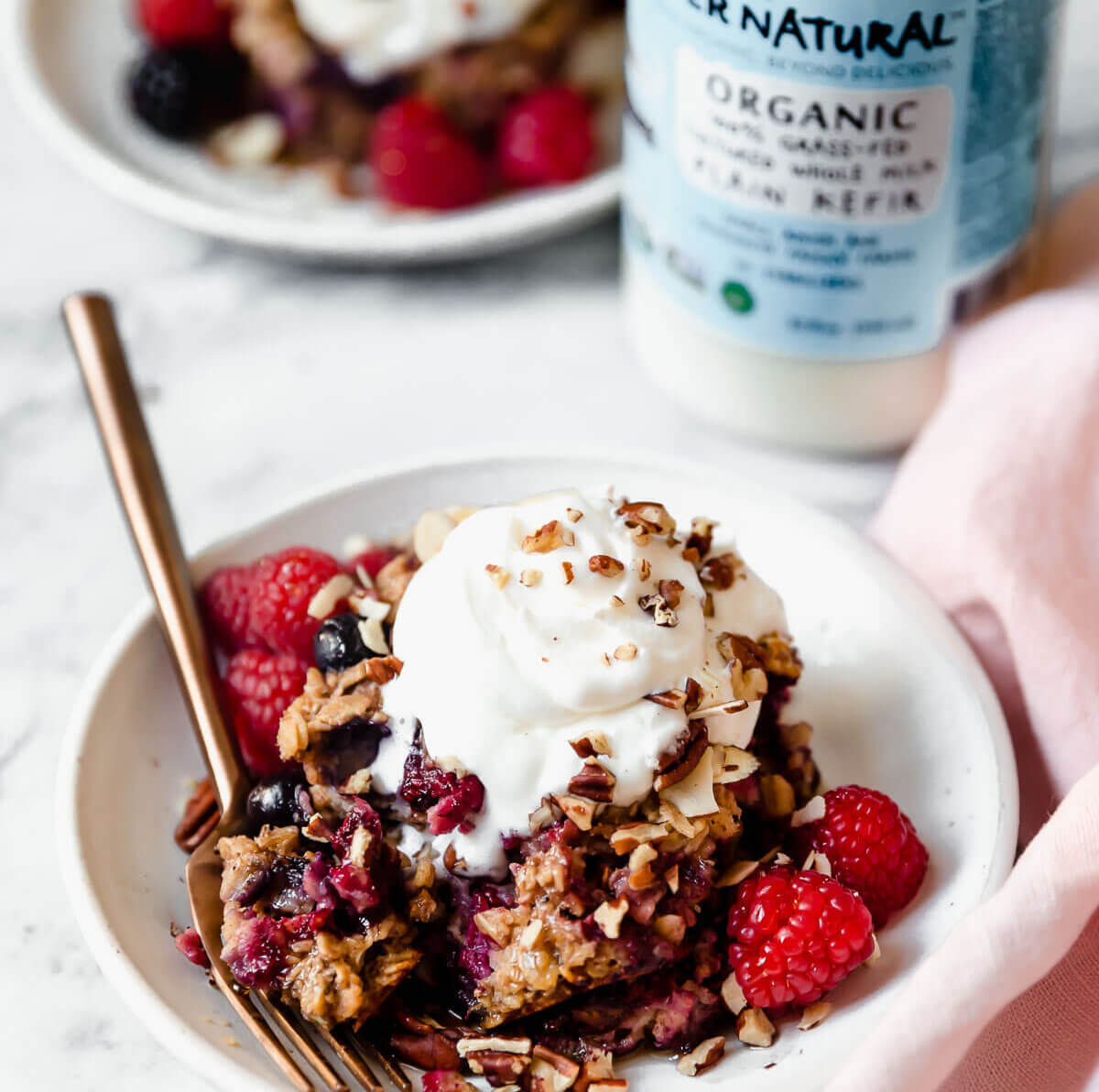 Very Berry Baked Oatmeal topped with plain yogurt